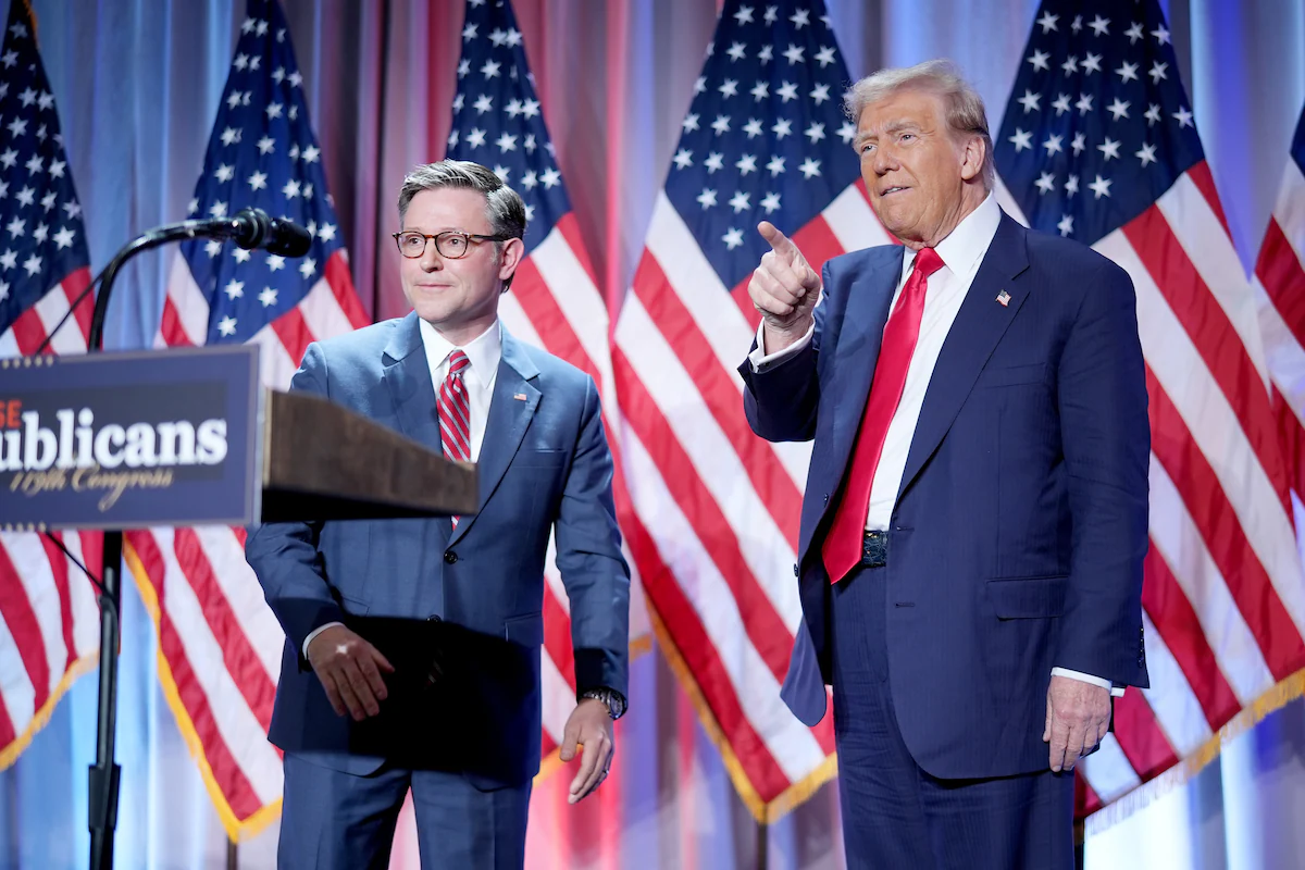 House Speaker Mike Johnson (R-Louisiana) welcomes President-elect Donald Trump at a House Republicans conference meeting Wednesday in Washington. 